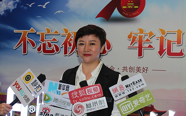 优秀肢体残疾人代表爱心企业家姜惠接受媒体采访