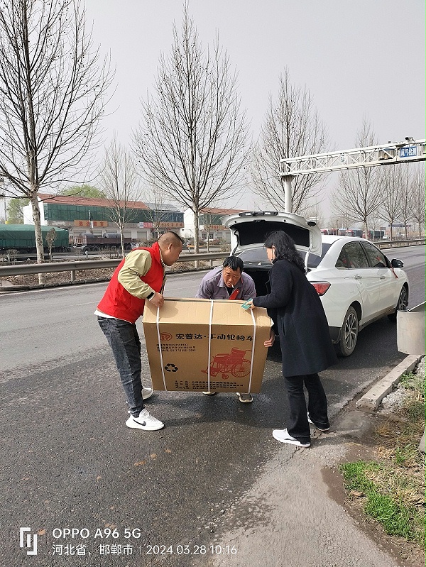 邯郸分公司携手肥乡发放轮椅辅具，助力残障人士的出行